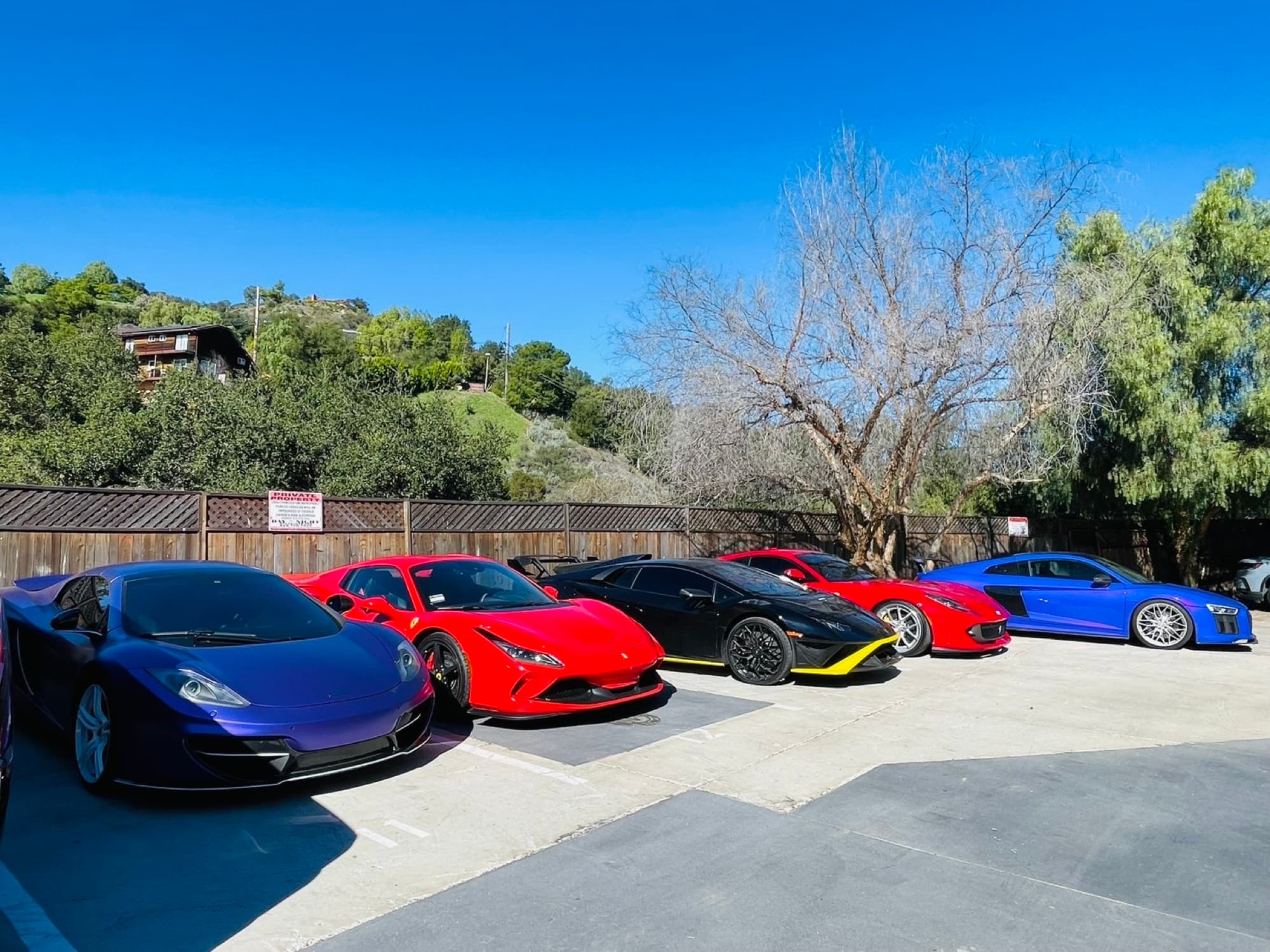 McLaren 12C, Ferrari F8, Lamborghini Huracán STO, Ferrari 812 and Audi R8 lined up